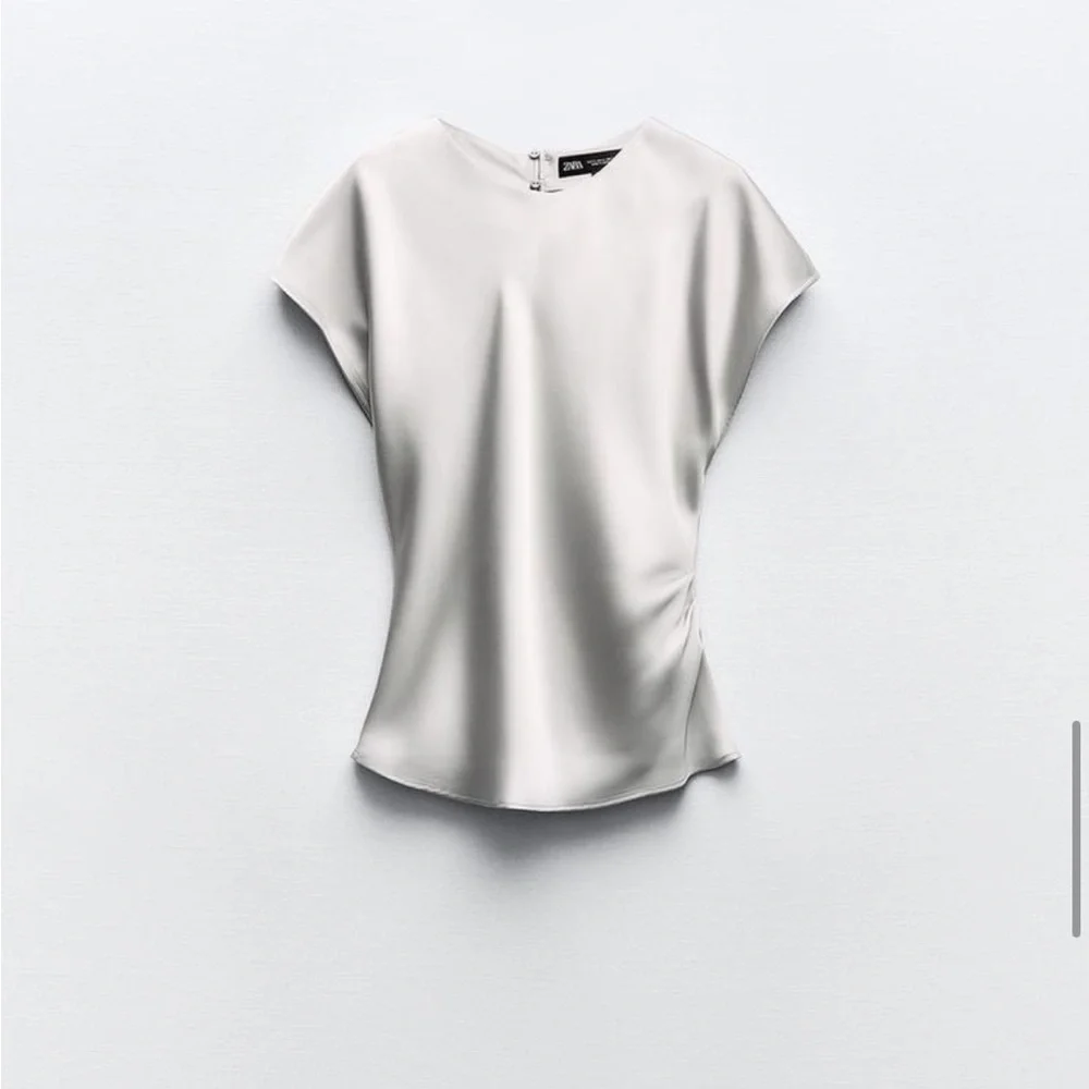 New with tags beautiful satin top